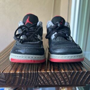 Jordan Kids Black and Gray Sneakers with Red Accents